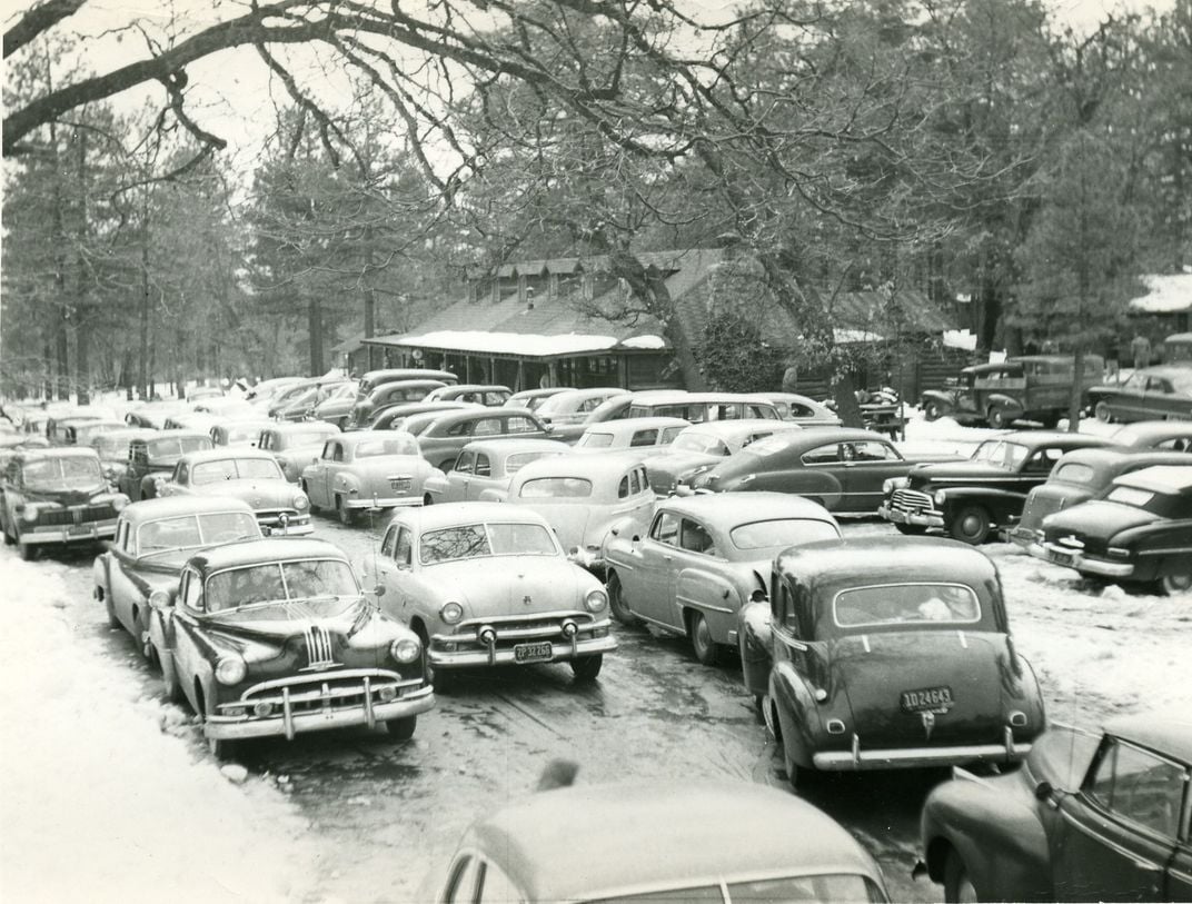 A group of cars photographed in January 1952