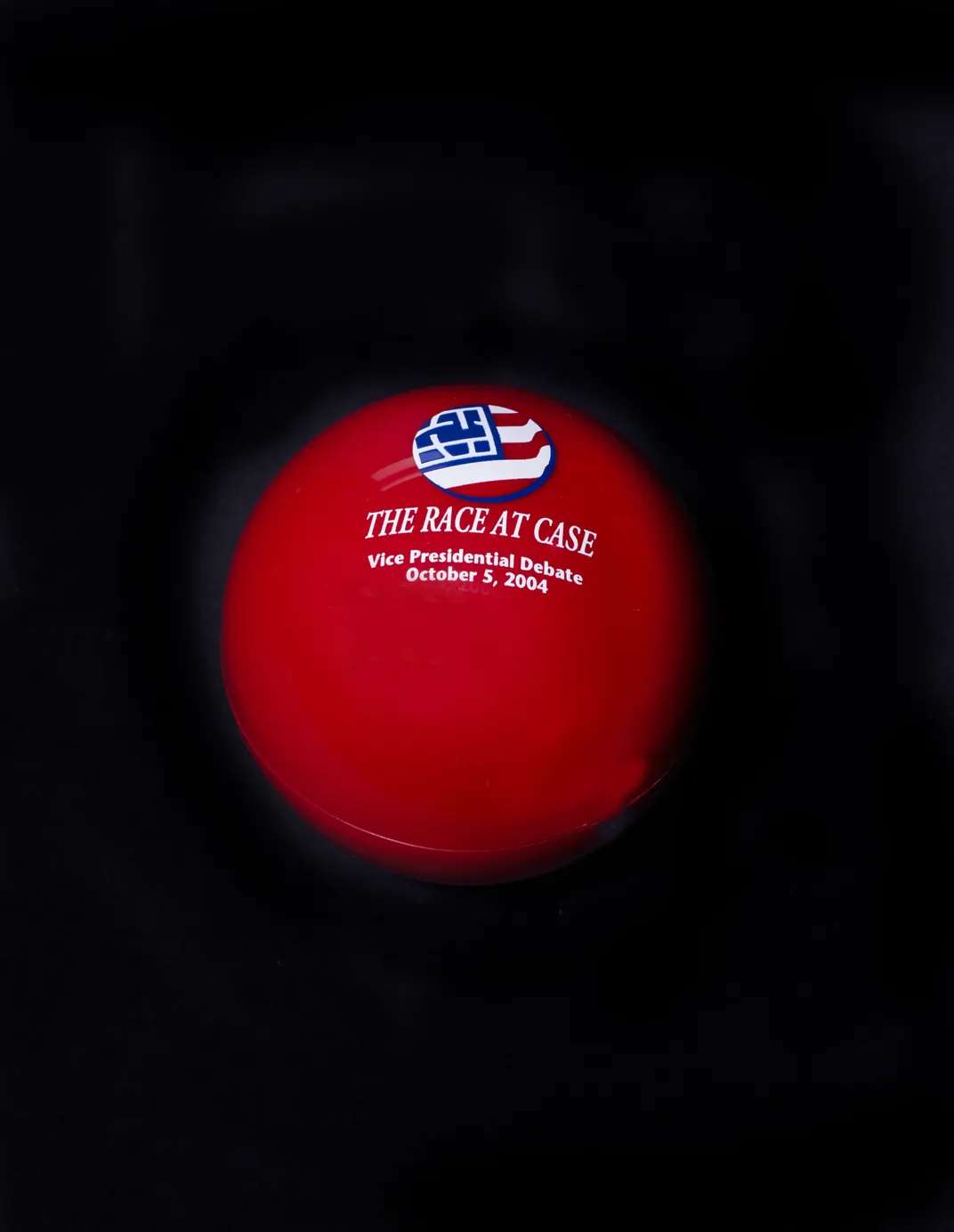 Red ball says "The Race at Case. Vice Presidential Debate. Octover 5, 2004"