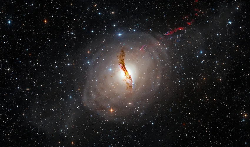 Centaurus A, a galaxy only visible from the Southern Hemisphere, shines with glowing jets of radiation.