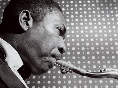 Coltrane rehearses backstage before a show in London in November 1961.&nbsp;