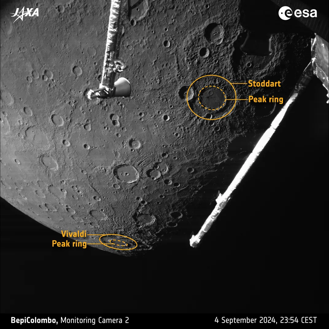 Black and white photo of planet surface, with yellow annotations and notes